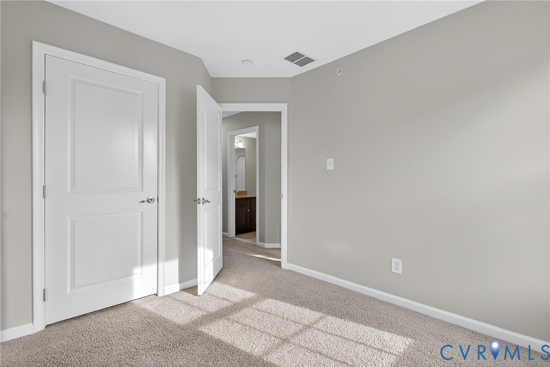 1903 Old Brick Road Glen Allen, VA 23060 - Photo 28 of 39 a view of a room with an empty space and closet area