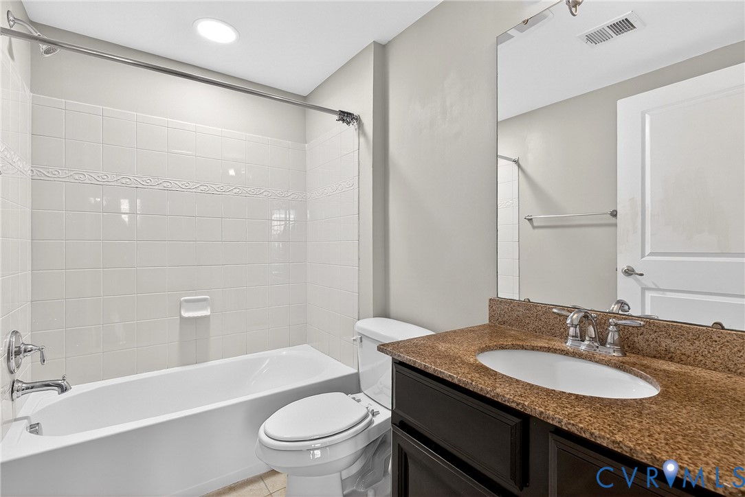 1903 Old Brick Road Glen Allen, VA 23060 - Photo 8 of 39 a bathroom with a granite countertop sink toilet and shower