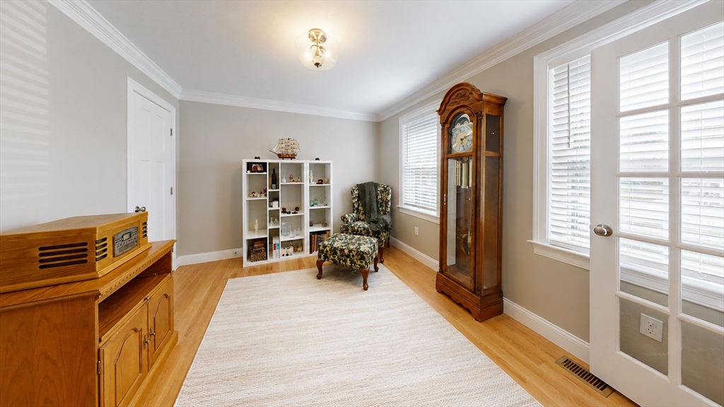 287 Wareham Street Middleboro, MA 02346 - Photo 7 of 28 a view of a room with furniture and wooden floor