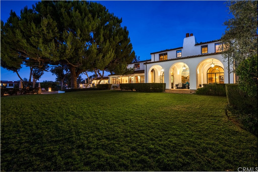 909 Vía Coronel Palos Verdes Estates, CA 90274 - Photo 13 of 59 a view of a big house with a big yard