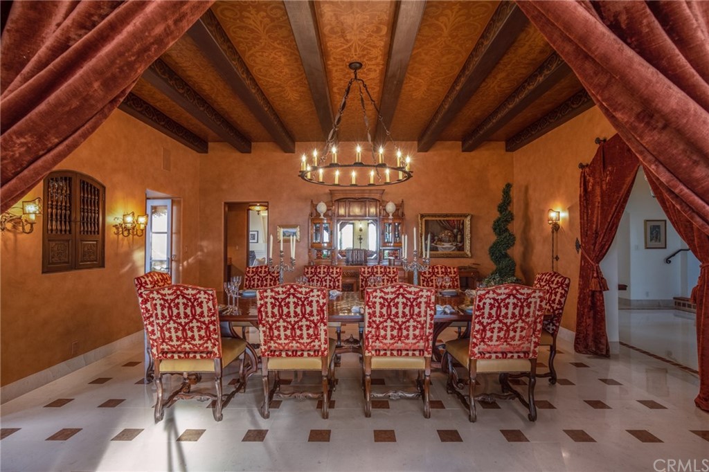 909 Vía Coronel Palos Verdes Estates, CA 90274 - Photo 23 of 59 a view of a dining room with furniture and chandelier