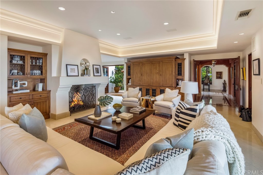 909 Vía Coronel Palos Verdes Estates, CA 90274 - Photo 24 of 59 a living room with furniture and a fireplace