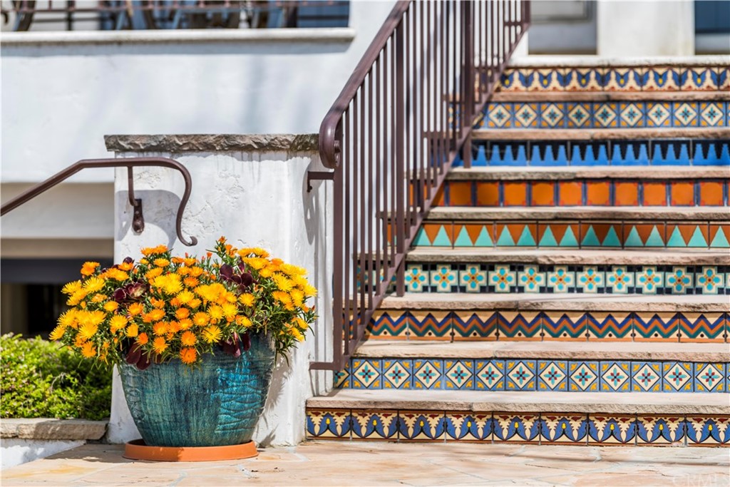909 Vía Coronel Palos Verdes Estates, CA 90274 - Photo 26 of 59 a front view of a building with a garden and deck