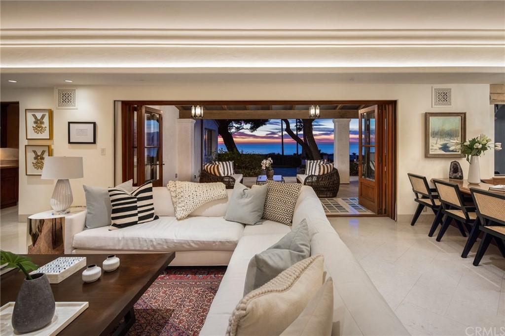 909 Vía Coronel Palos Verdes Estates, CA 90274 - Photo 27 of 59 a living room with furniture and a fireplace