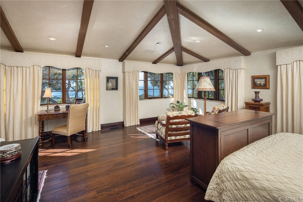 909 Vía Coronel Palos Verdes Estates, CA 90274 - Photo 34 of 59 a view of a livingroom with furniture a flat screen tv and wooden floor