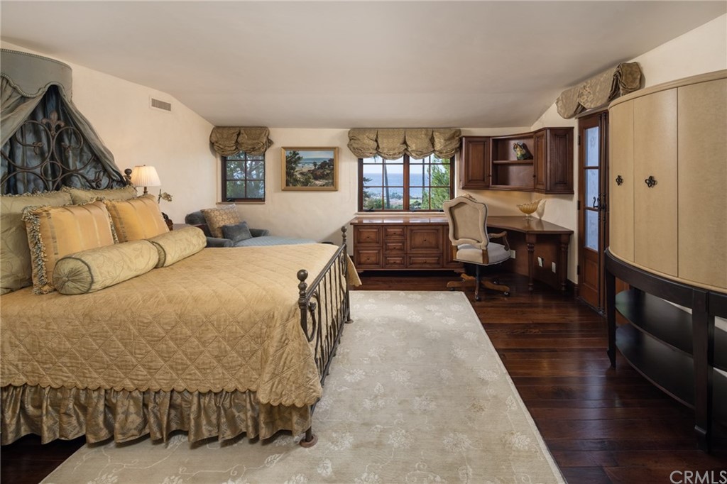 909 Vía Coronel Palos Verdes Estates, CA 90274 - Photo 36 of 59 a bedroom with a bed couch and a window