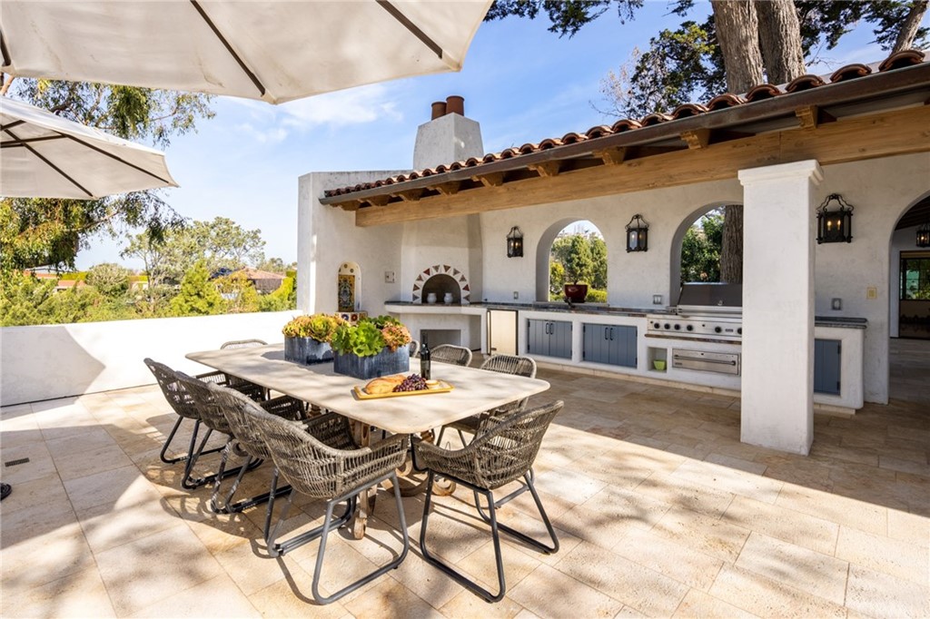 909 Vía Coronel Palos Verdes Estates, CA 90274 - Photo 44 of 59 a view of a dining room with furniture and wooden floor