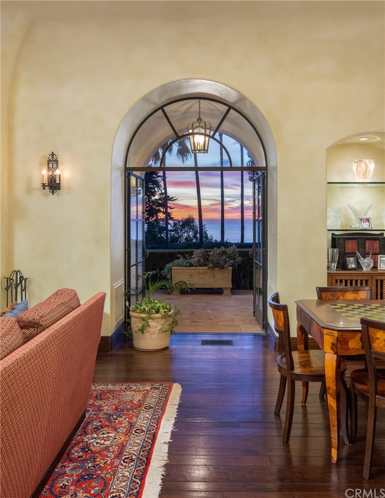 909 Vía Coronel Palos Verdes Estates, CA 90274 - Photo 56 of 59 a living room with furniture a window and a dining table