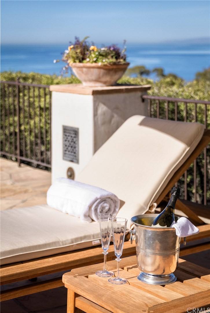 909 Vía Coronel Palos Verdes Estates, CA 90274 - Photo 7 of 59 a view of a living room with a sink and chandelier