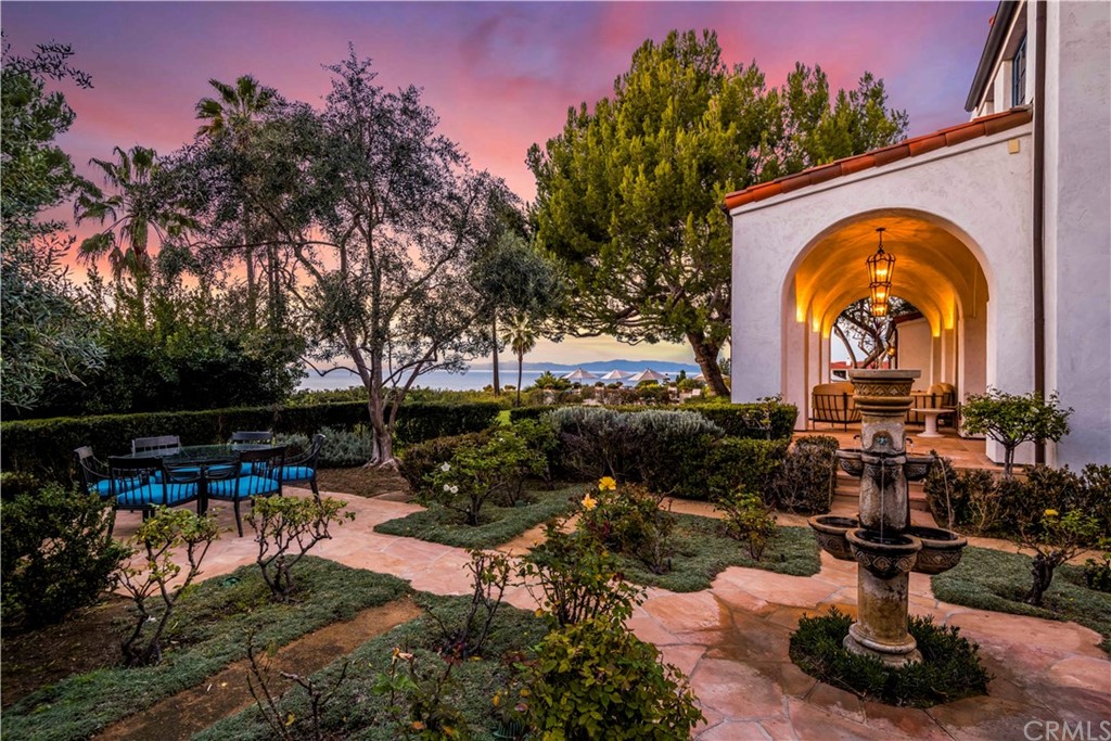 909 Vía Coronel Palos Verdes Estates, CA 90274 - Photo 9 of 59 a front view of a house with garden