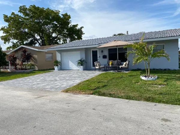 a front view of a house with patio