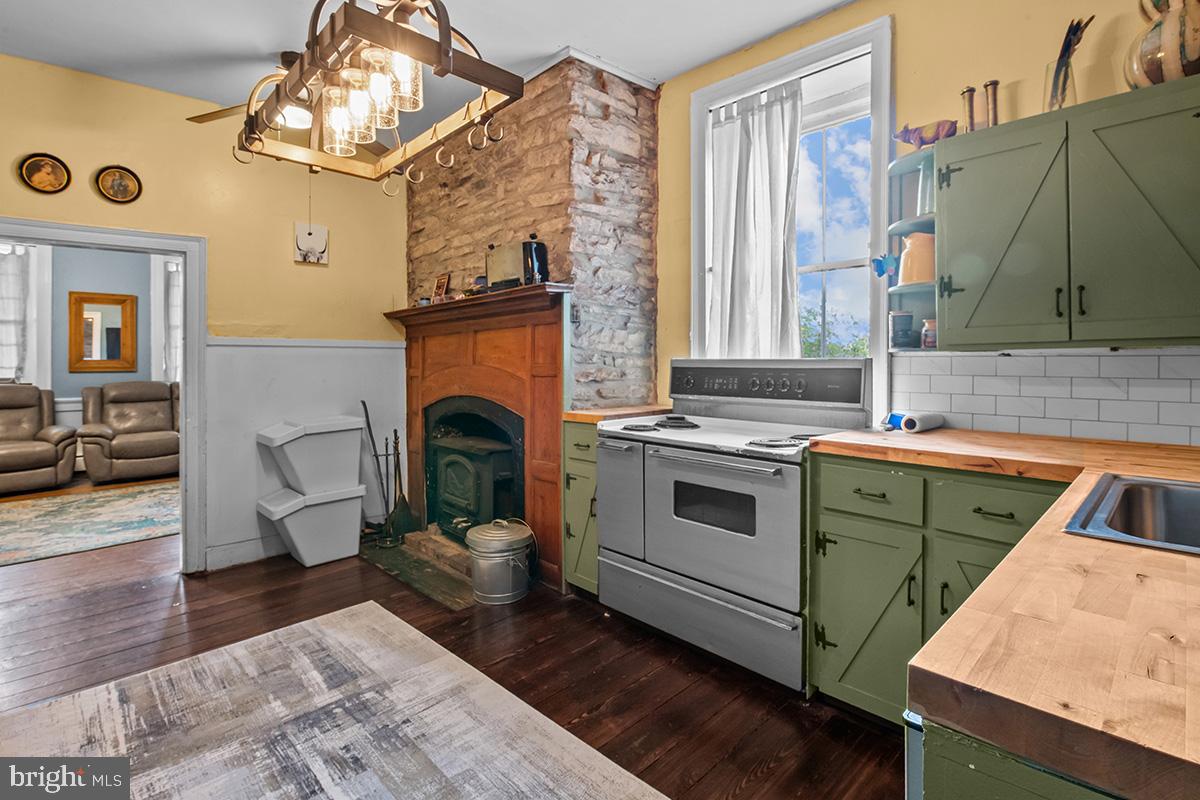 3059 Peters Mountain Road Halifax, PA 17032 - Photo 18 of 43 a kitchen with a stove and a sink