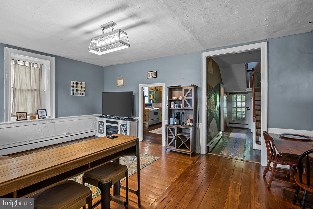 3059 Peters Mountain Road Halifax, PA 17032 - Photo 22 of 43 a reading room with wooden floor and furniture