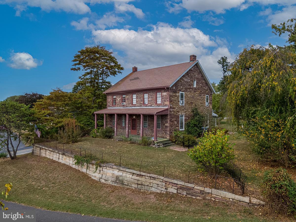 3059 Peters Mountain Road Halifax, PA 17032 - Photo 3 of 43 front view of a house with a yard