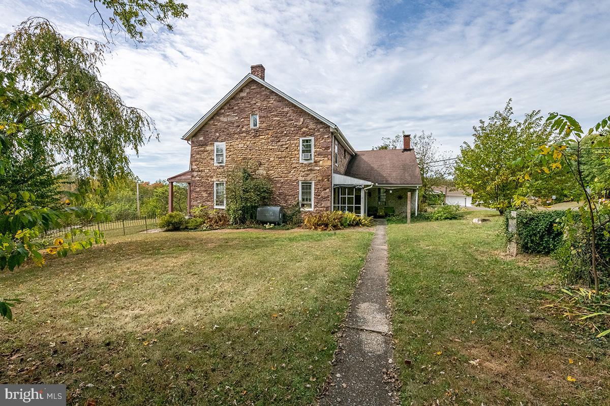 3059 Peters Mountain Road Halifax, PA 17032 - Photo 5 of 43 a front view of a house with a yard
