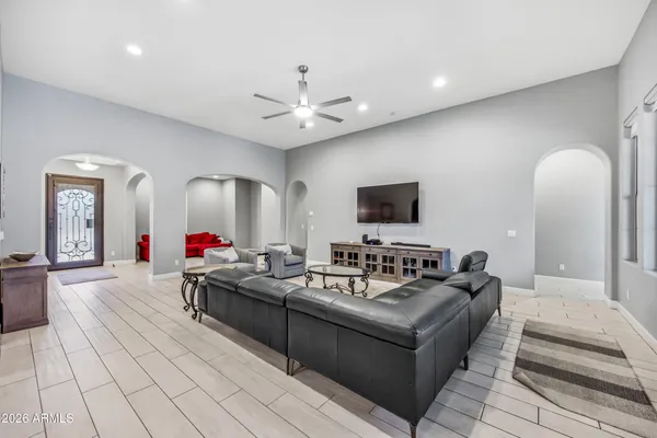a view of workspace with wooden floor windows