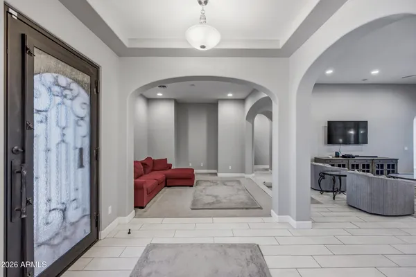 a view of a livingroom with furniture and window