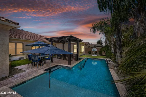 a spacious bedroom with a large bed and a window