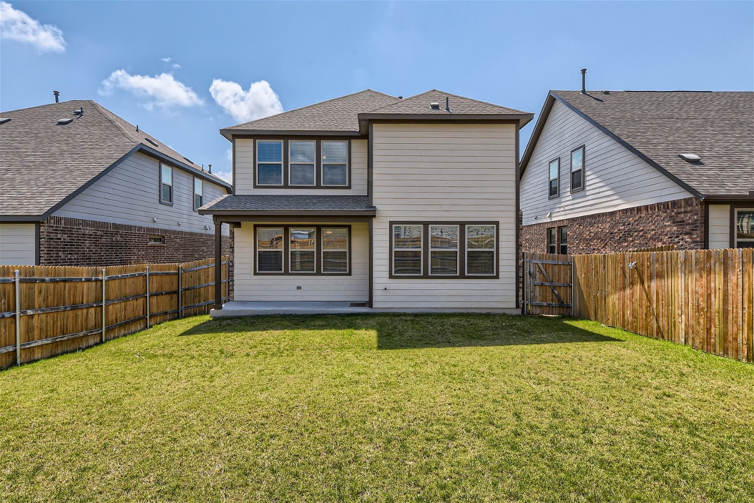 11612 Caithness Way Austin, TX 78754 - Photo 11 of 11 a view of a house with wooden fence