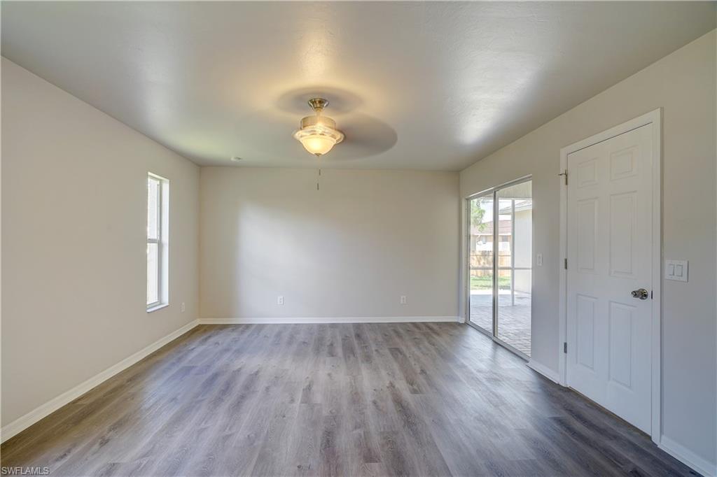 8381 Blackberry Road Fort Myers, FL 33967 - Photo 15 of 36 Empty room featuring ceiling fan and light hardwood / wood-style flooring