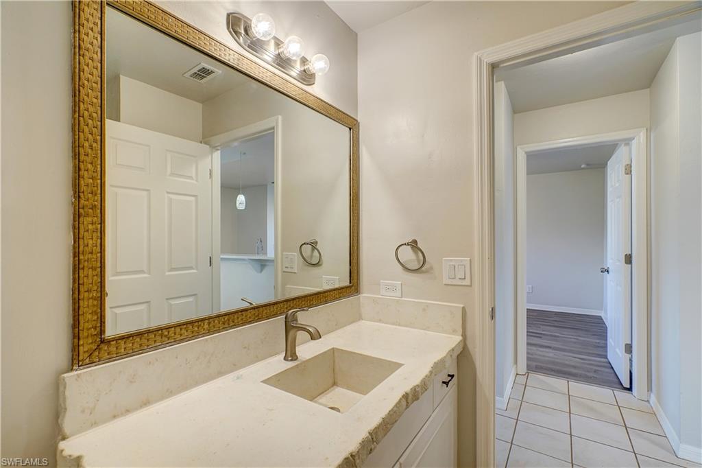 8381 Blackberry Road Fort Myers, FL 33967 - Photo 23 of 36 Bathroom featuring vanity and tile patterned floors
