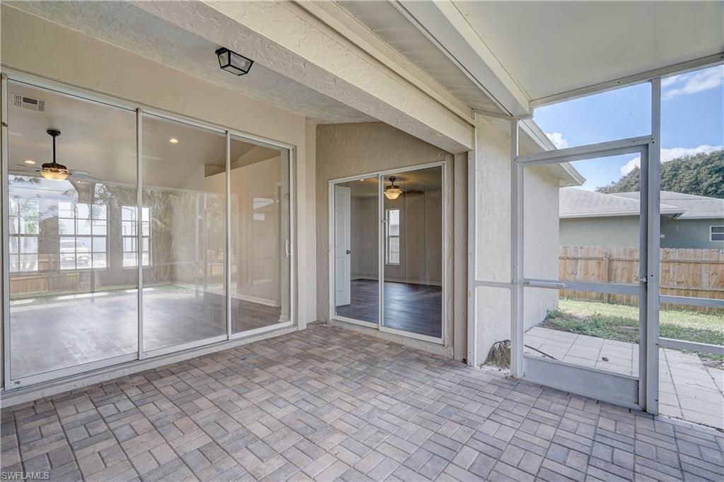 8381 Blackberry Road Fort Myers, FL 33967 - Photo 26 of 36 Unfurnished sunroom featuring ceiling fan and plenty of natural light