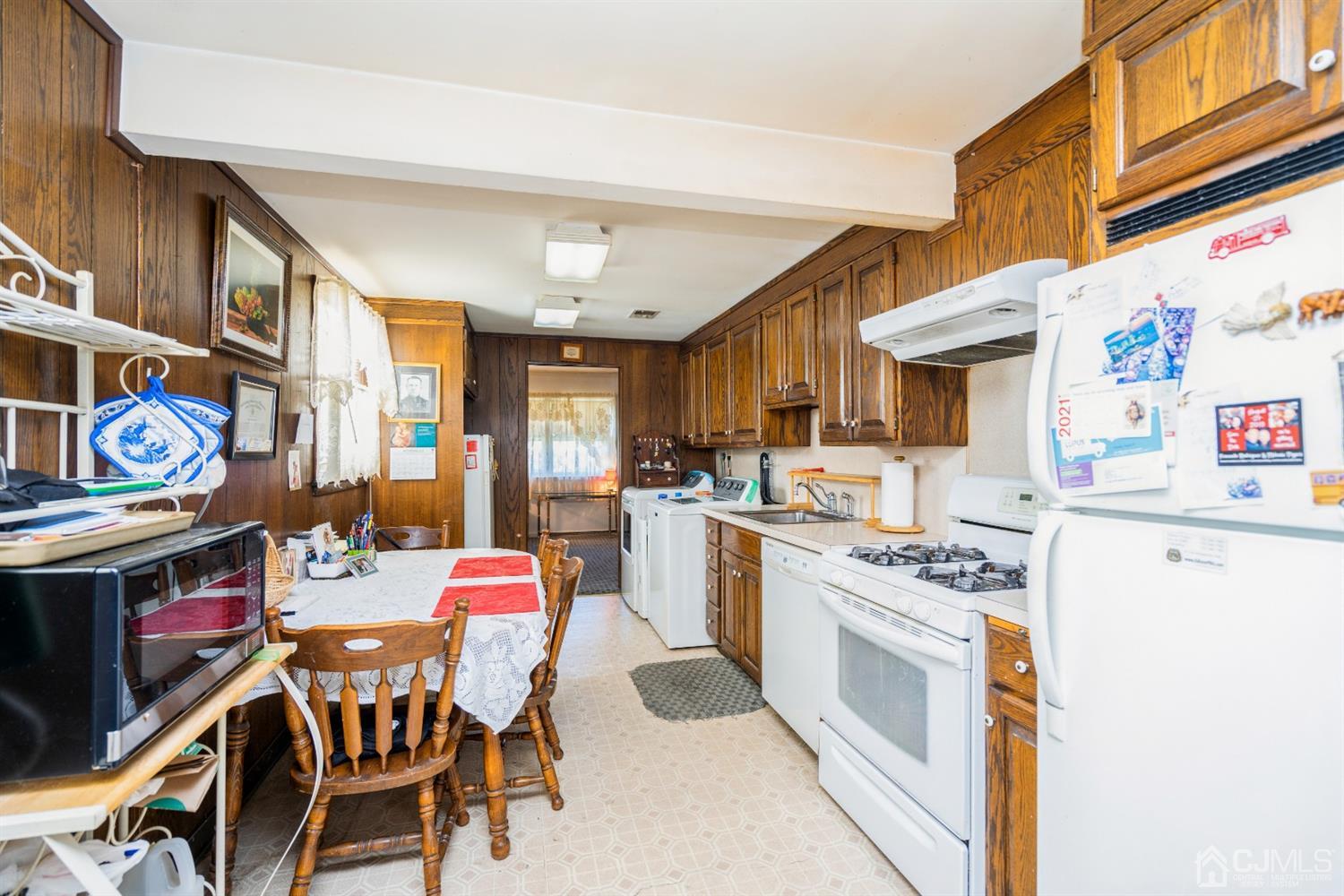 32 Idlewild Road Edison, NJ 08817 - Photo 8 of 14 a open kitchen with stainless steel appliances granite countertop a stove and a refrigerator