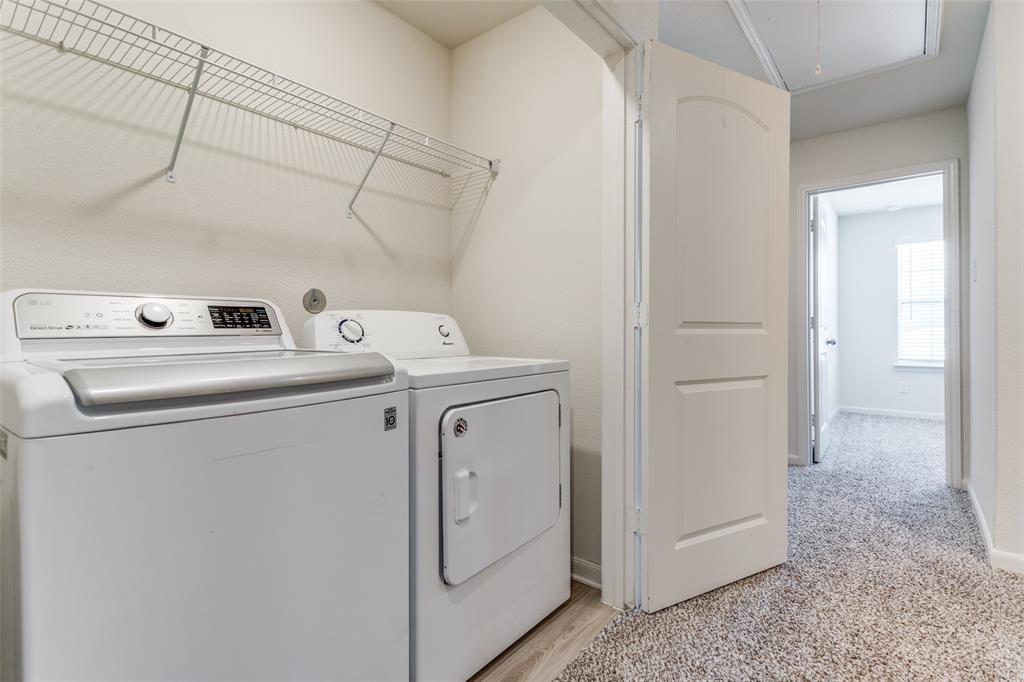 320 Stone Court Princeton, TX 75407 - Photo 12 of 15 a utility room with dryer and washer
