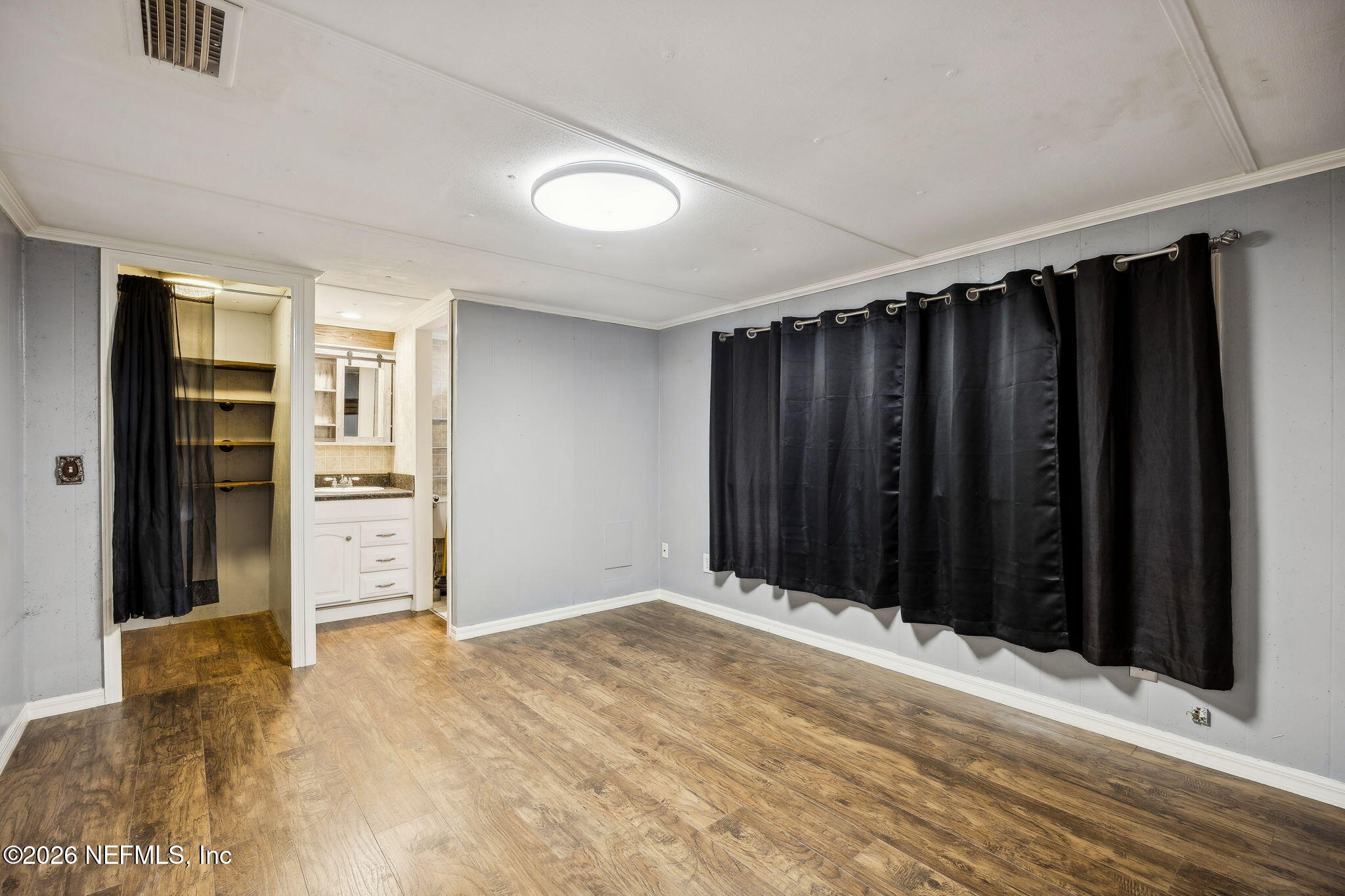8117 Northwest County Road, Unit 225 Raiford, FL 32083 - Photo 18 of 38 a view of a room with a wooden walls