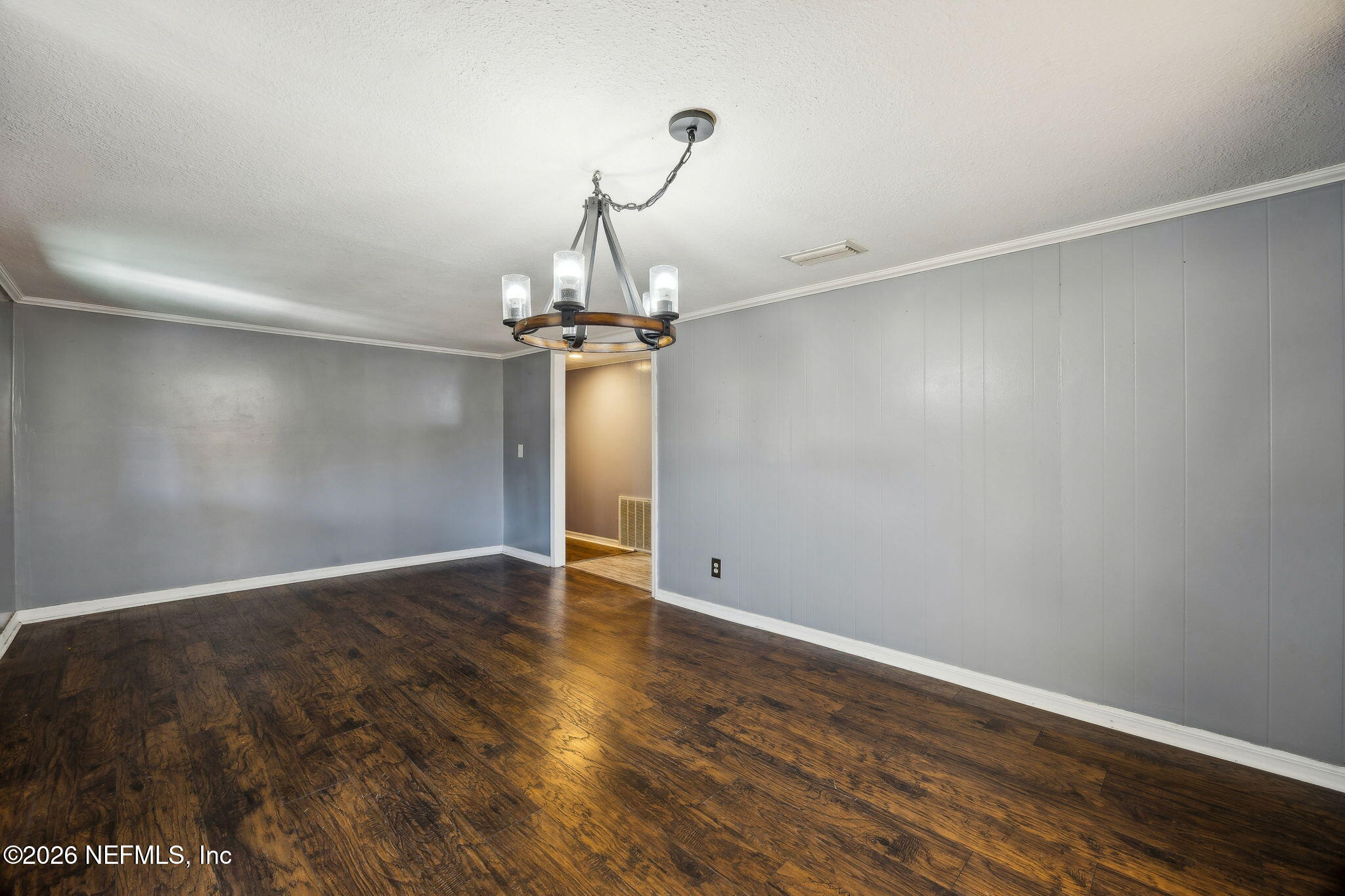 8117 Northwest County Road, Unit 225 Raiford, FL 32083 - Photo 25 of 38 a view of empty room with wooden floor