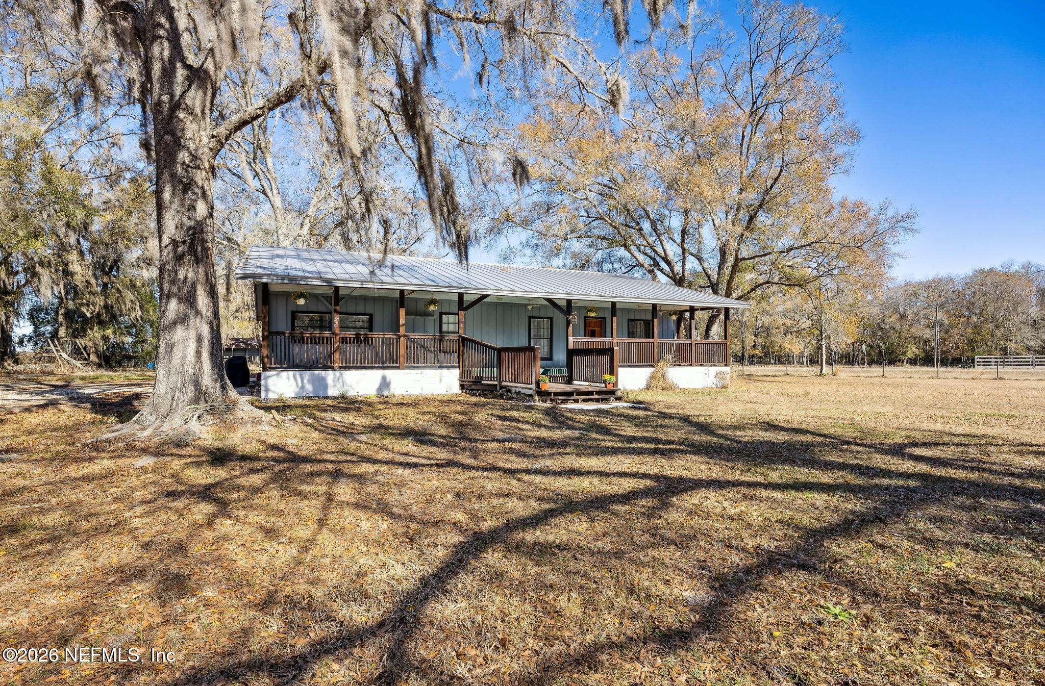 8117 Northwest County Road, Unit 225 Raiford, FL 32083 - Photo 37 of 38 a view of a building with snow on the background