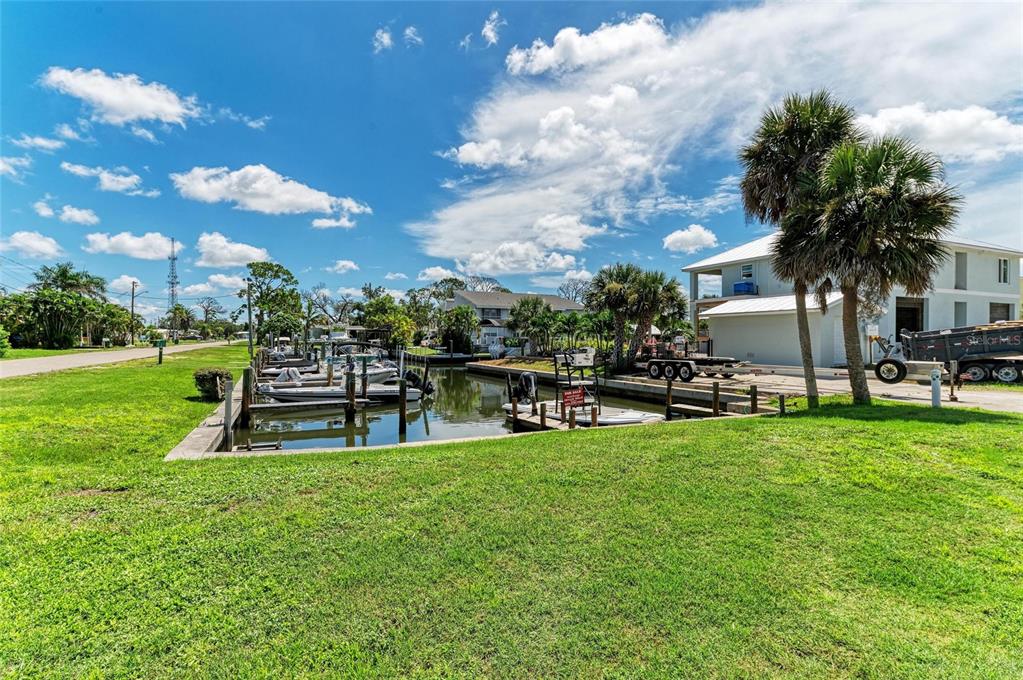 8165 Archie Street Englewood, FL 34224 - Photo 5 of 5 a view of a garden with lawn chairs
