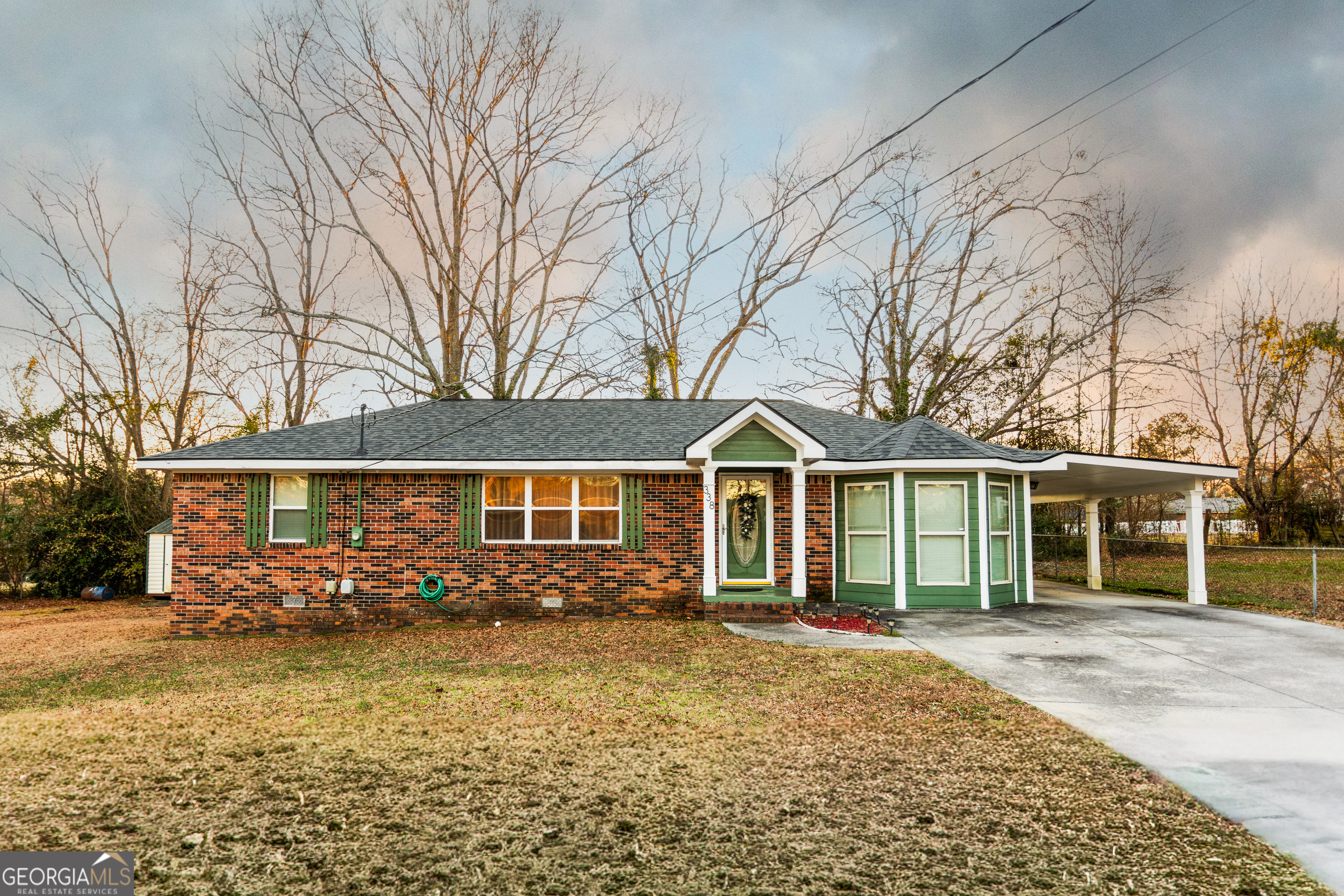 338 Boxwood Street Social Circle, GA 30025 - Photo 1 of 22 front view of a house with a yard