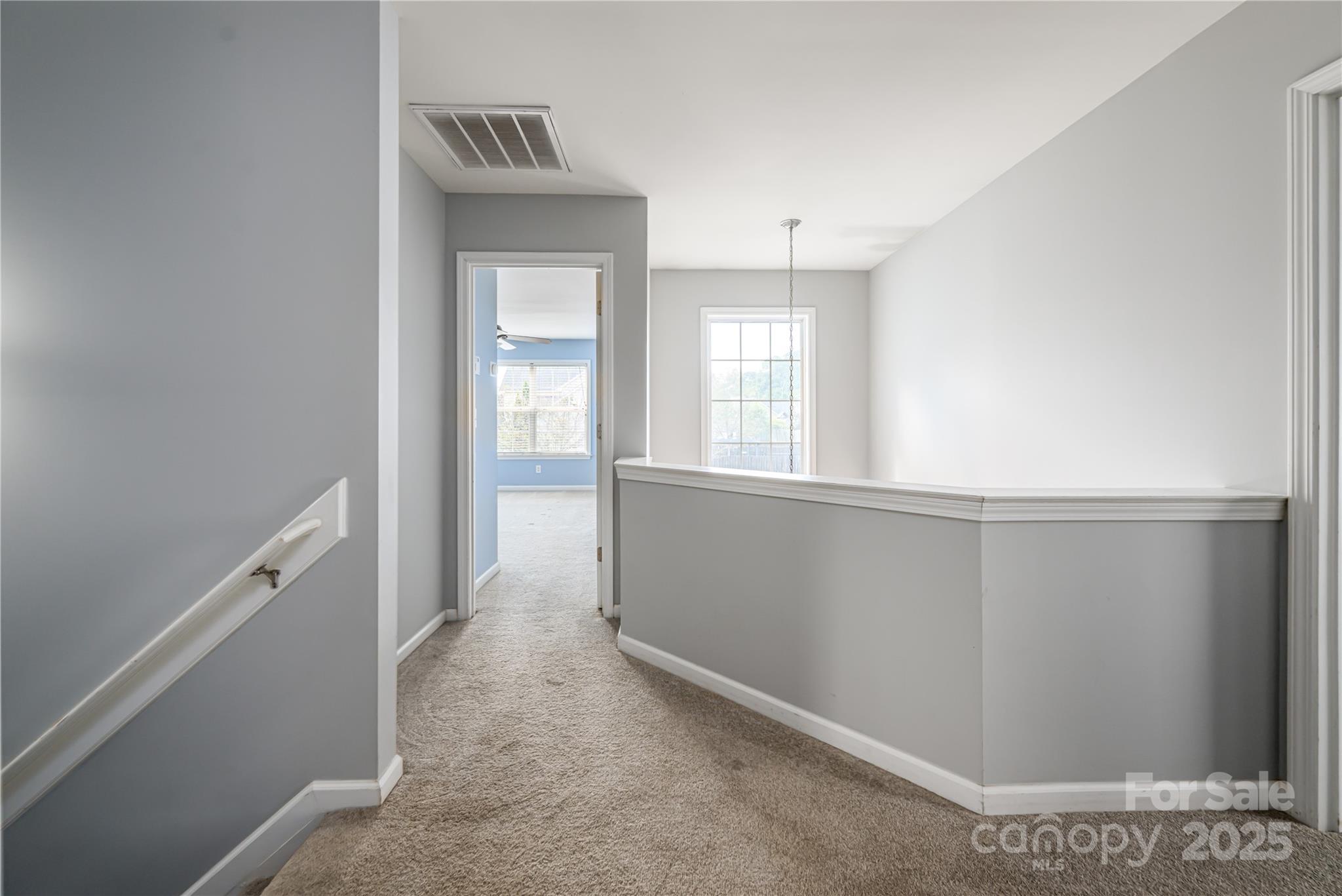 163 Yadkin Road Fletcher, NC 28732 - Photo 24 of 43 a view of an empty room with a window