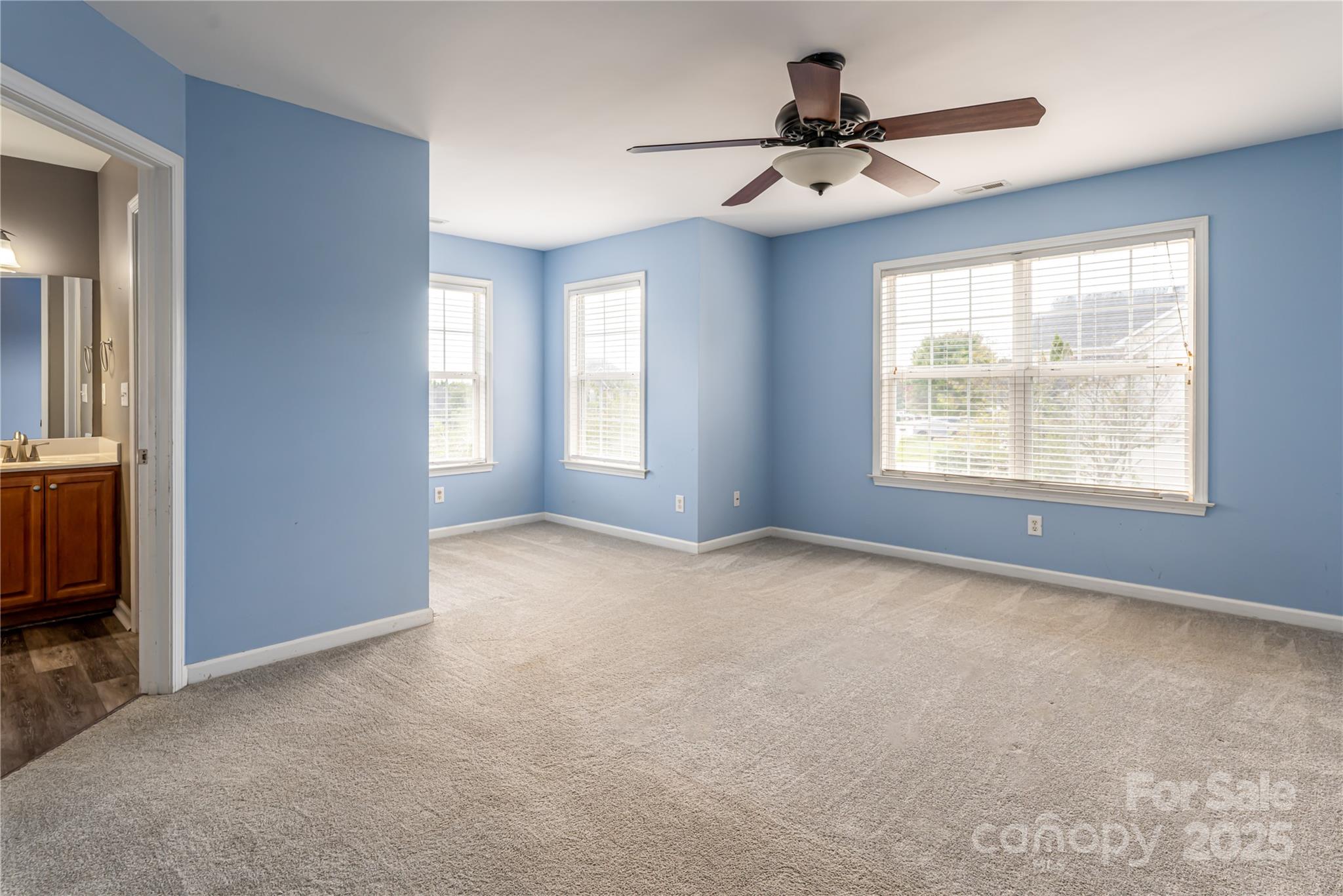 163 Yadkin Road Fletcher, NC 28732 - Photo 25 of 43 a view of a livingroom with a ceiling fan and window