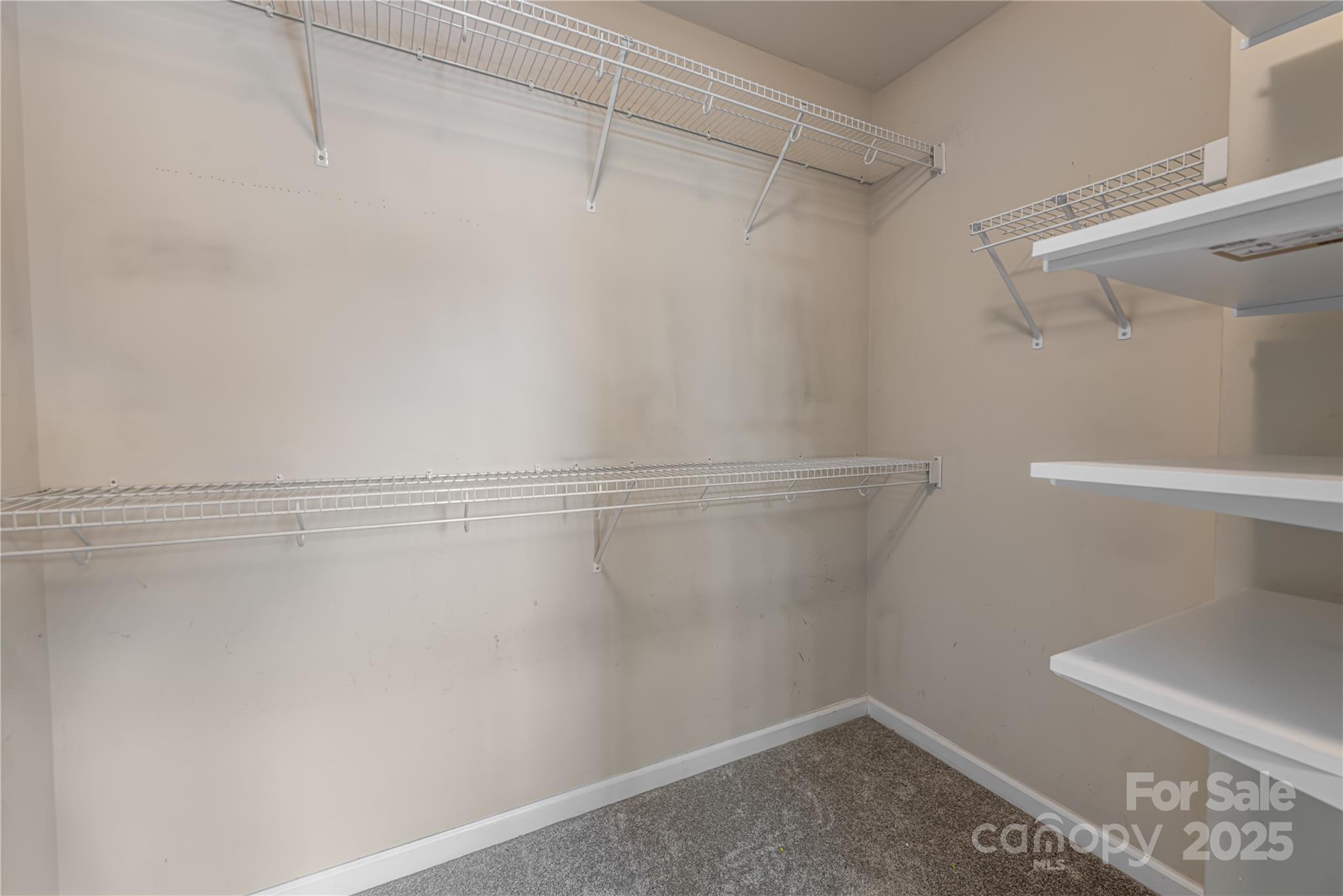 163 Yadkin Road Fletcher, NC 28732 - Photo 31 of 43 a view of a room with racks on the wall