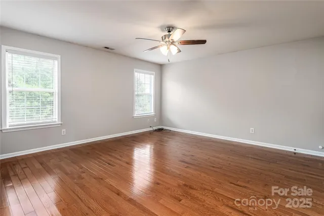wooden floor and windows in a room