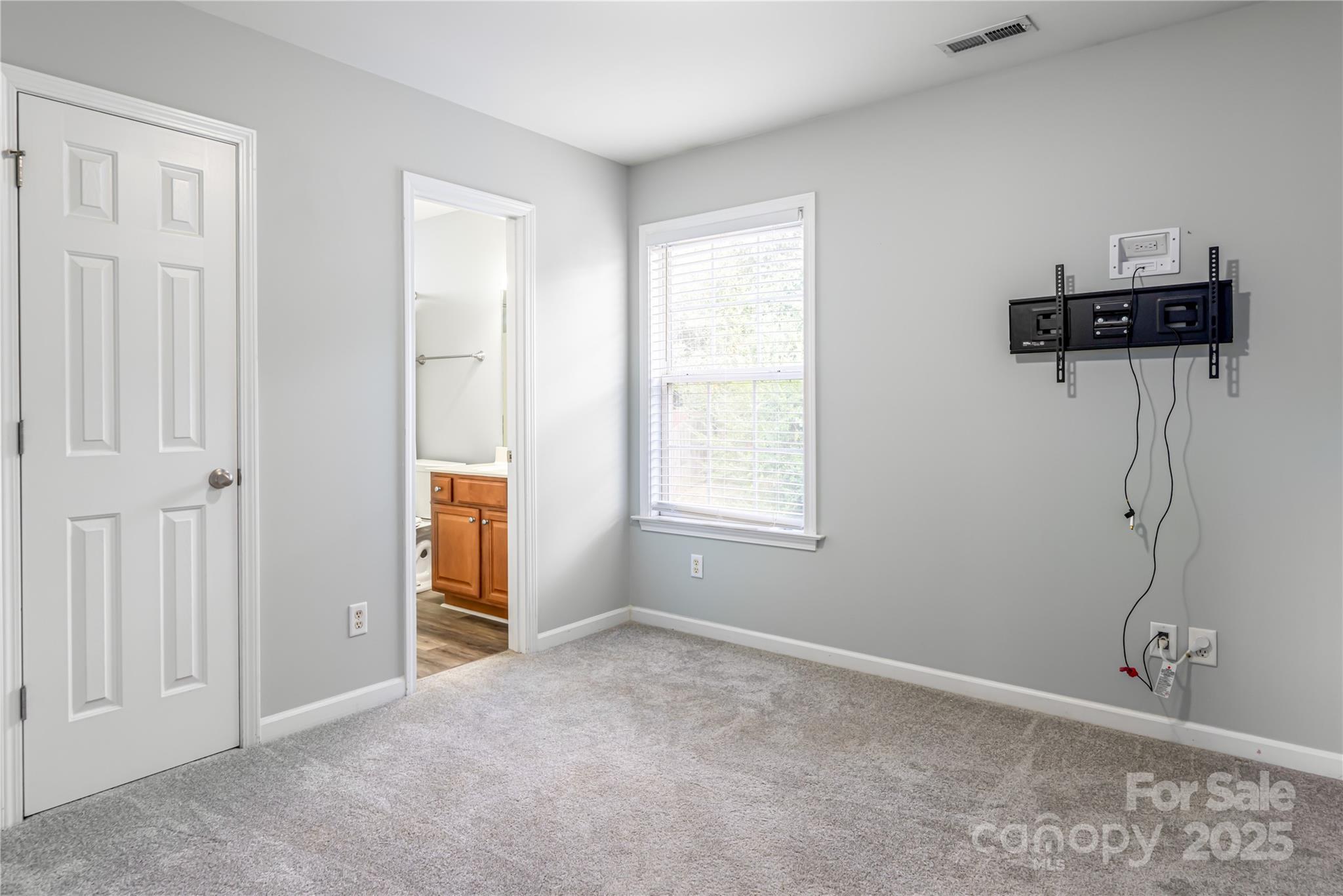 163 Yadkin Road Fletcher, NC 28732 - Photo 34 of 43 wooden floor and windows in a room