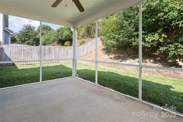 a view of a backyard with barn