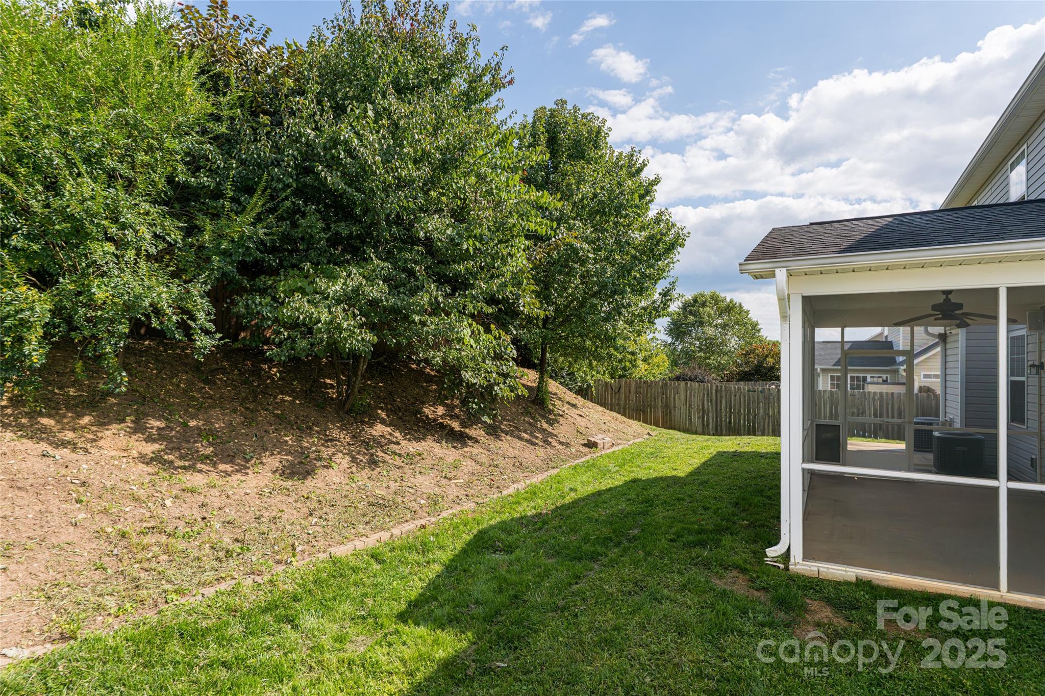 163 Yadkin Road Fletcher, NC 28732 - Photo 39 of 43 a view of a backyard with barn