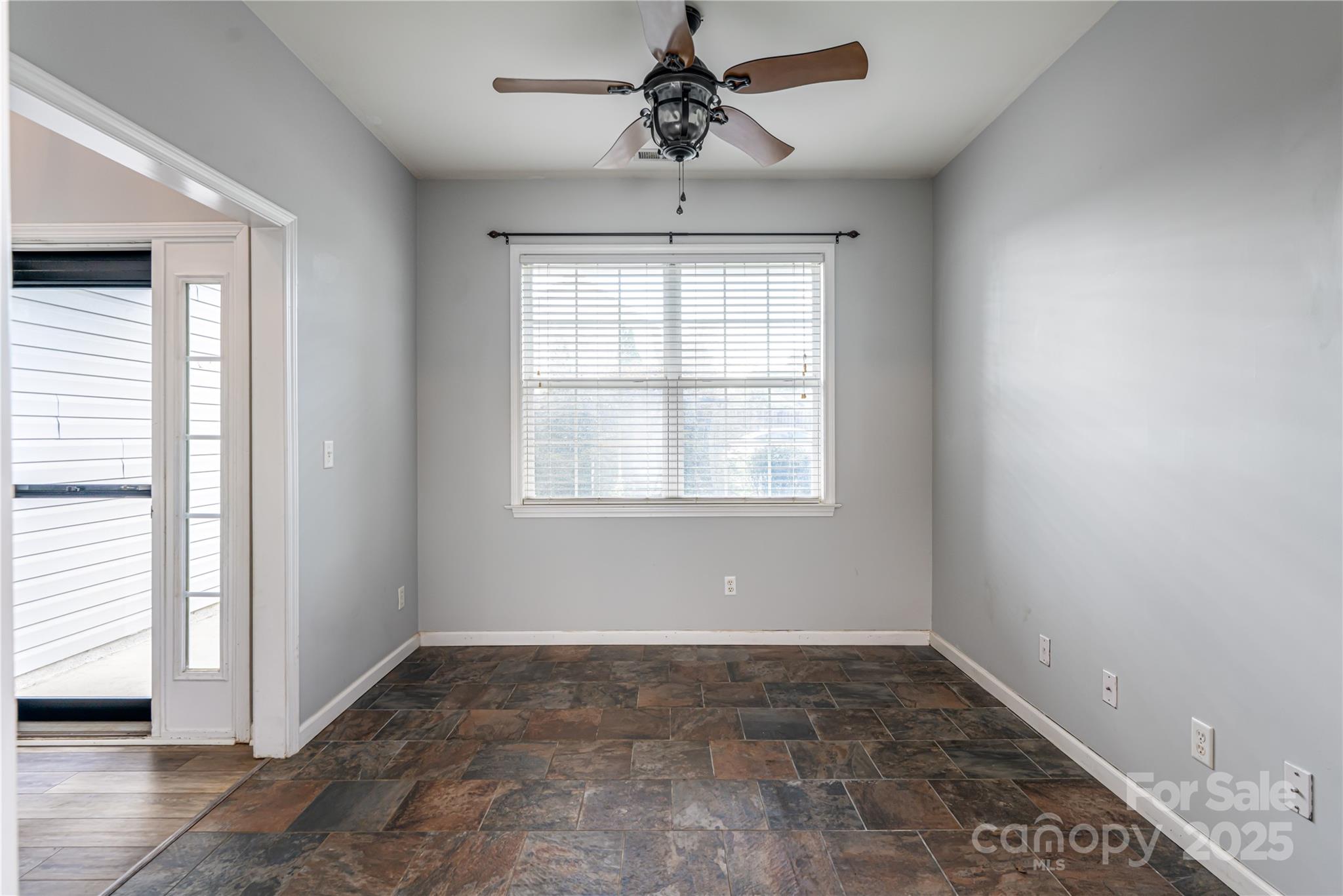 163 Yadkin Road Fletcher, NC 28732 - Photo 9 of 43 a view of empty room with ceiling fan