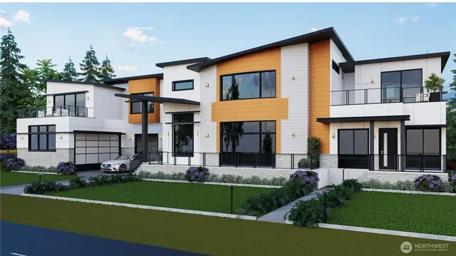 a front view of a house with a garden and plants