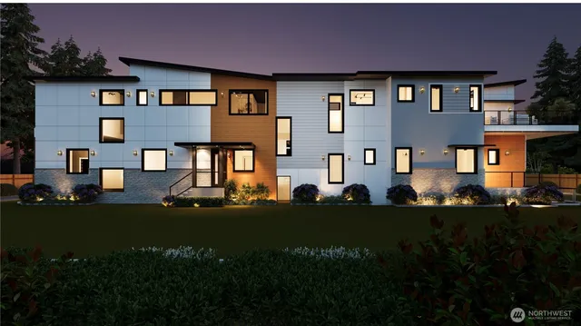 a front view of a building with a garden