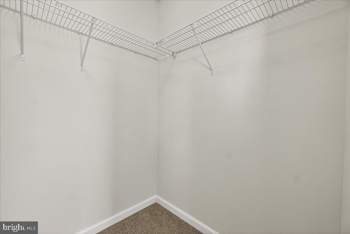 1600 Corn Crib Place Frederick, MD 21702 - Photo 25 of 38 a view of a room with racks on the wall