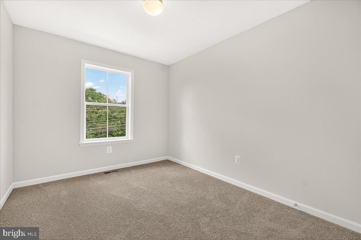 1600 Corn Crib Place Frederick, MD 21702 - Photo 28 of 38 an empty room with a window