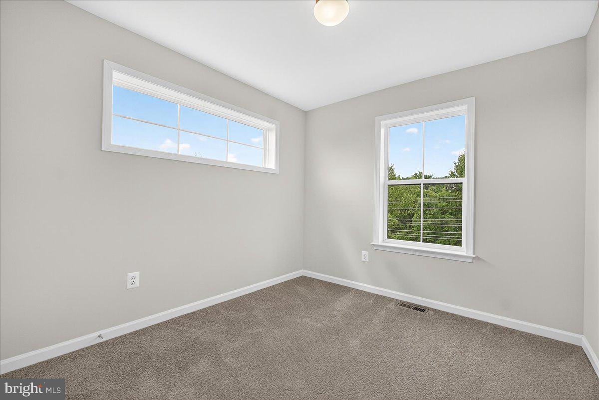 1600 Corn Crib Place Frederick, MD 21702 - Photo 29 of 38 an empty room with a window