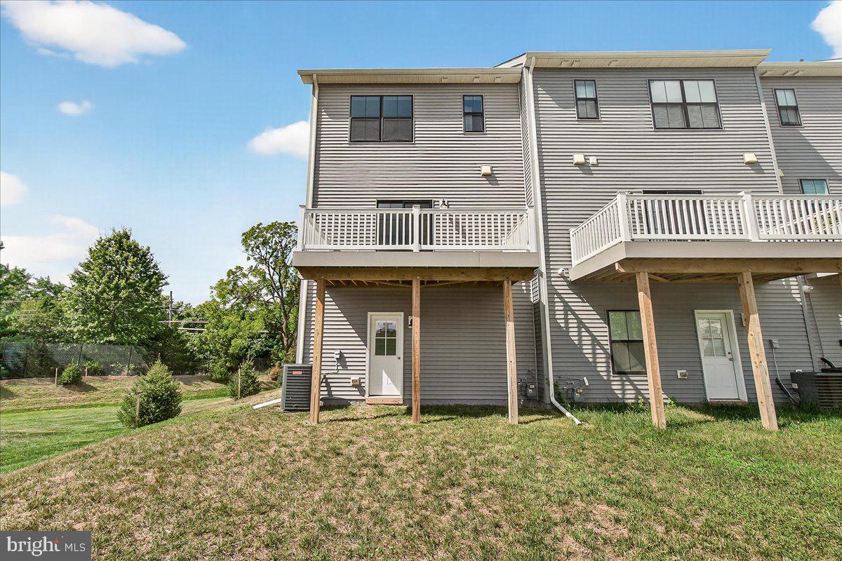 1600 Corn Crib Place Frederick, MD 21702 - Photo 34 of 38 a view of a house with a yard