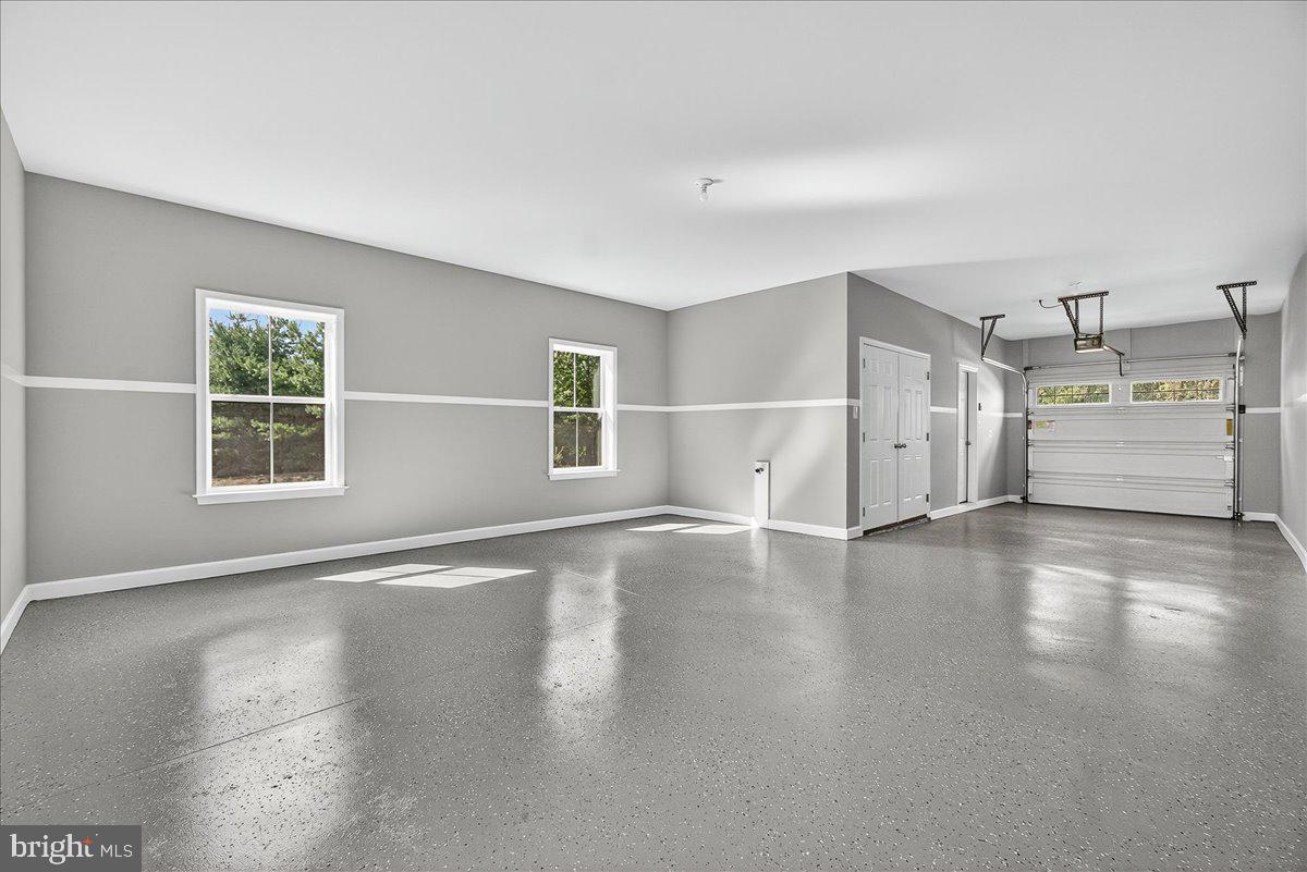 1600 Corn Crib Place Frederick, MD 21702 - Photo 7 of 38 an empty room with windows