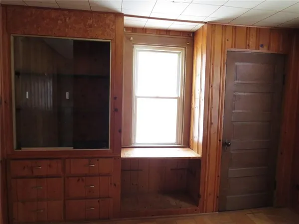 a kitchen with a refrigerator and a sink