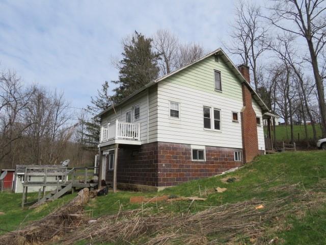2189 Dunn Station Road Prosperity, PA 15329 - Photo 28 of 36 a view of a house with yard and a tree